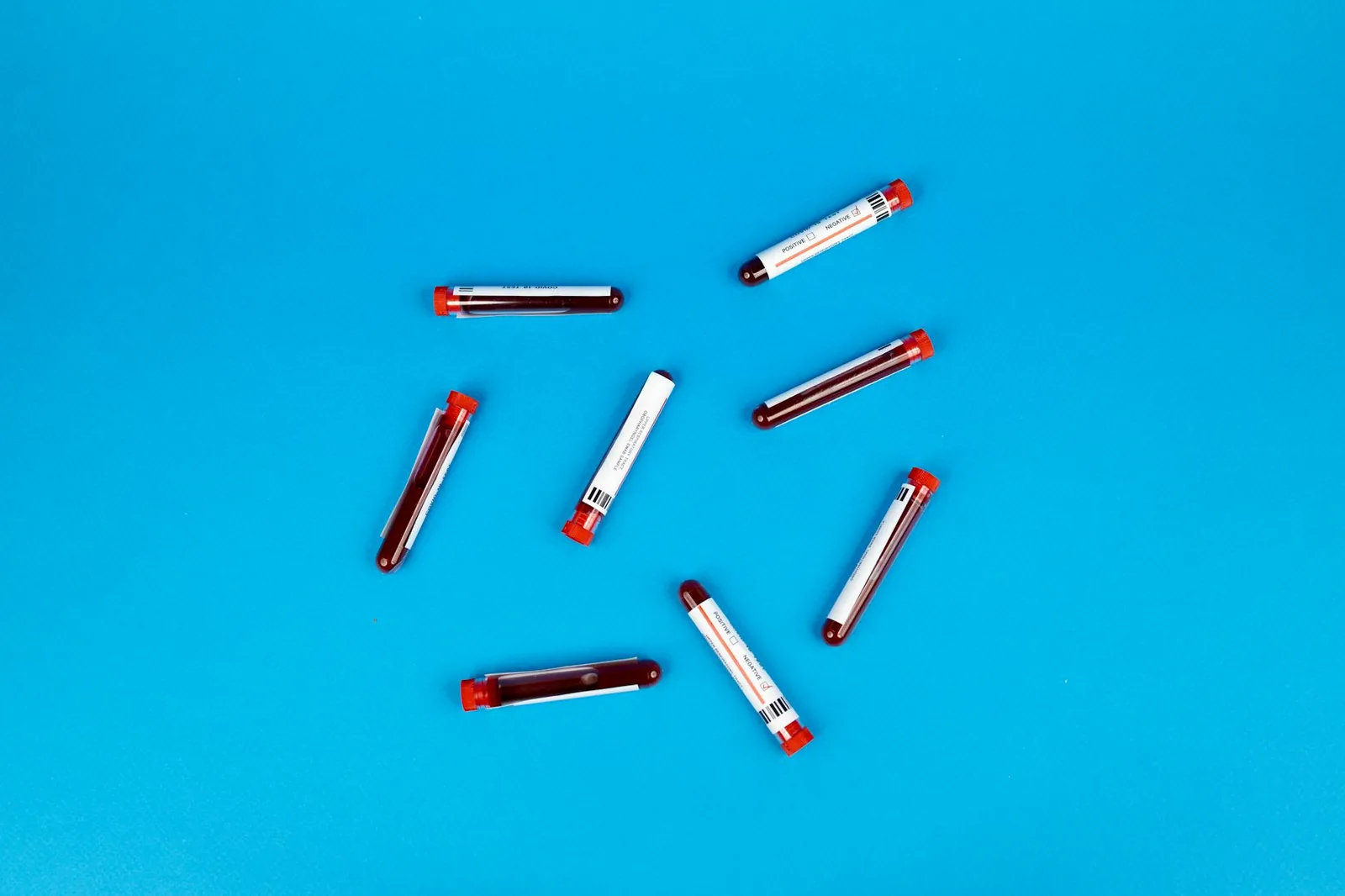A row of labeled blood sample tubes ready for analysis, the only way to know what your actual 25-hydroxyvitamin D level is.